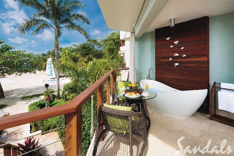 Jamaica  - Negril Sandals Negril Beach Resort & Spa - Caribbean Beachfront Walkout Grande Luxe Club Level Room w/ Patio Tranquility Soaking Tub